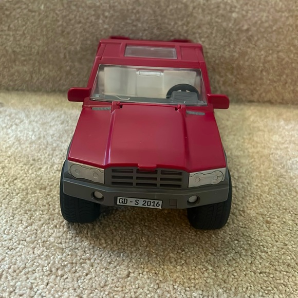 Red truck for horses it does have a broken door but still works. - Picture 1 of 6